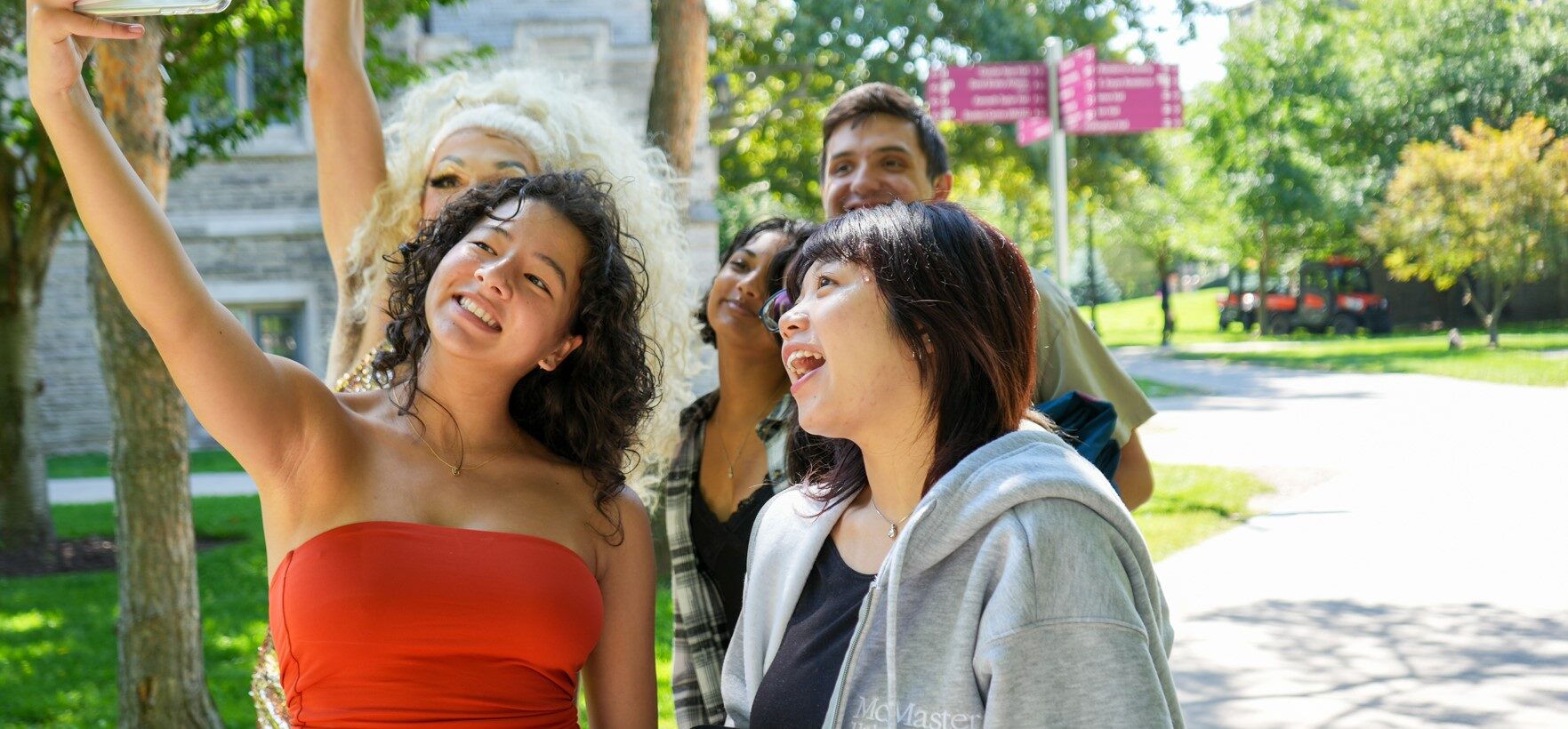 Students taking selfie at the Faculty Hollow pathway