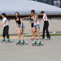 First-year students rollerblading at Pier 8.