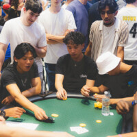 First-year students in a large crowd playing poker.