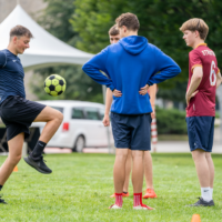 First-year students playing with a soccer ball.