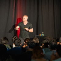 McMaster presenter giving a speech at McMaster Welcome.